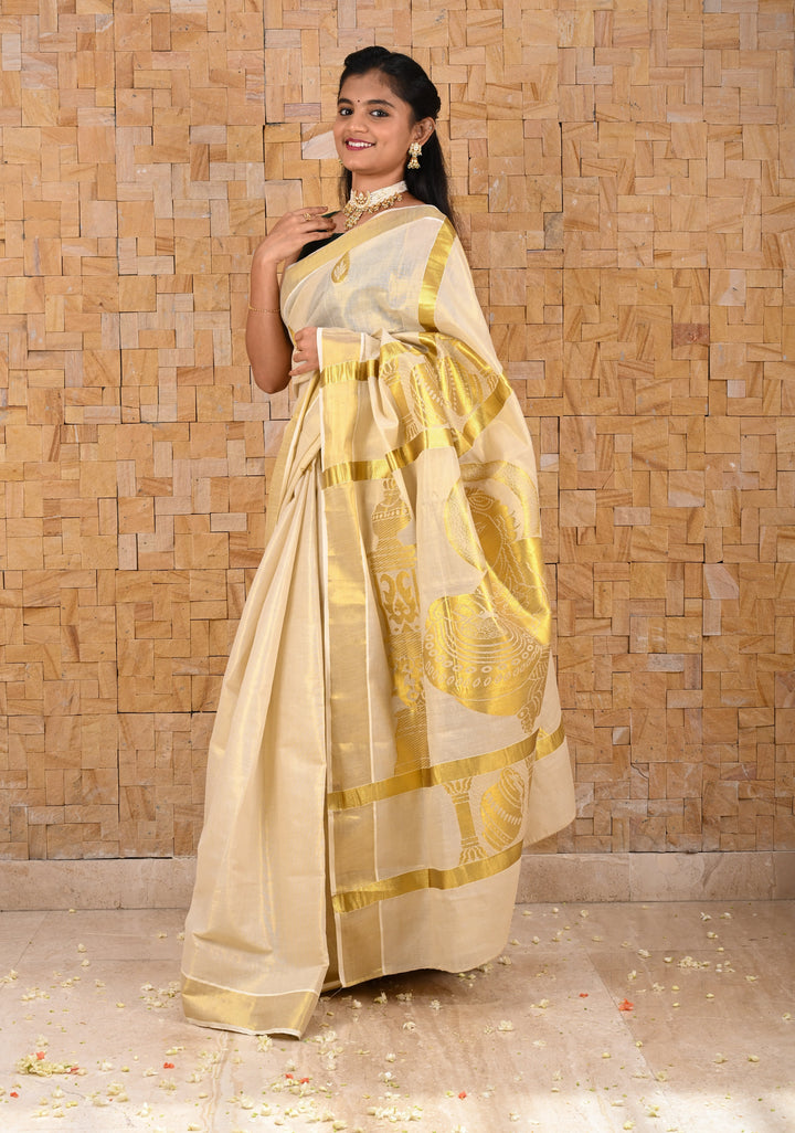 Unique Kerala Kasavu Saree in Tissue Cotton with Zari Buttas and Baby Krishna Theme on Pallu