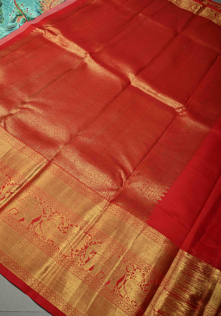 Aqua Blue Pure Kanjivaram Silk Saree with Feather Digital Print and Red Contrast Zari Border | SILK MARK CERTIFIED | SHOBITAM
