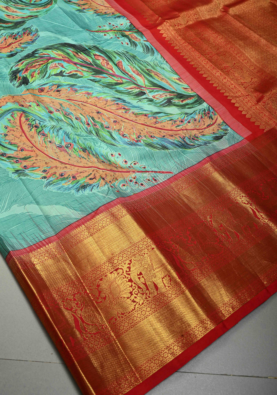 Aqua Blue Pure Kanjivaram Silk Saree with Feather Digital Print and Red Contrast Zari Border | SILK MARK CERTIFIED | SHOBITAM