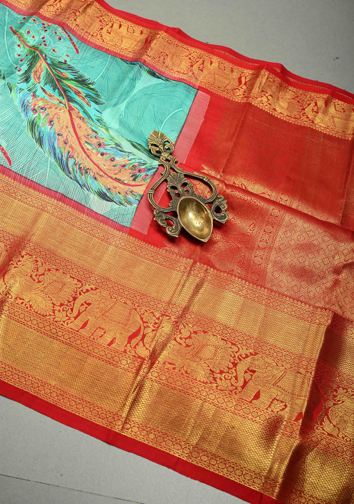 Aqua Blue Pure Kanjivaram Silk Saree with Feather Digital Print and Red Contrast Zari Border | SILK MARK CERTIFIED | SHOBITAM
