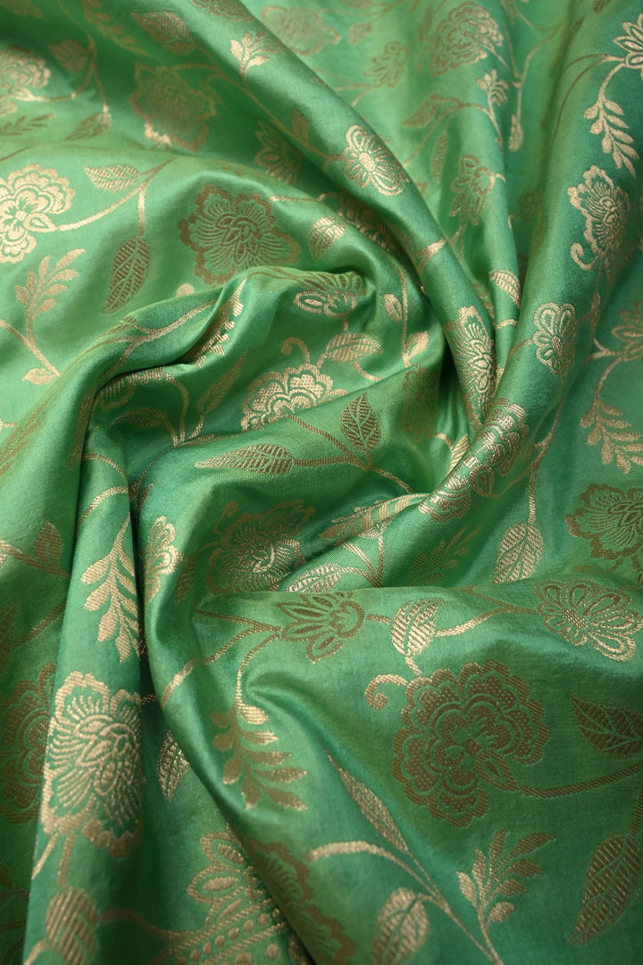 Sea Green Dual tone Pure Banarasi Katan Silk Saree with Floral Jaal and Zari Border | SILK MARK CERTIFIED | SHOBITAM