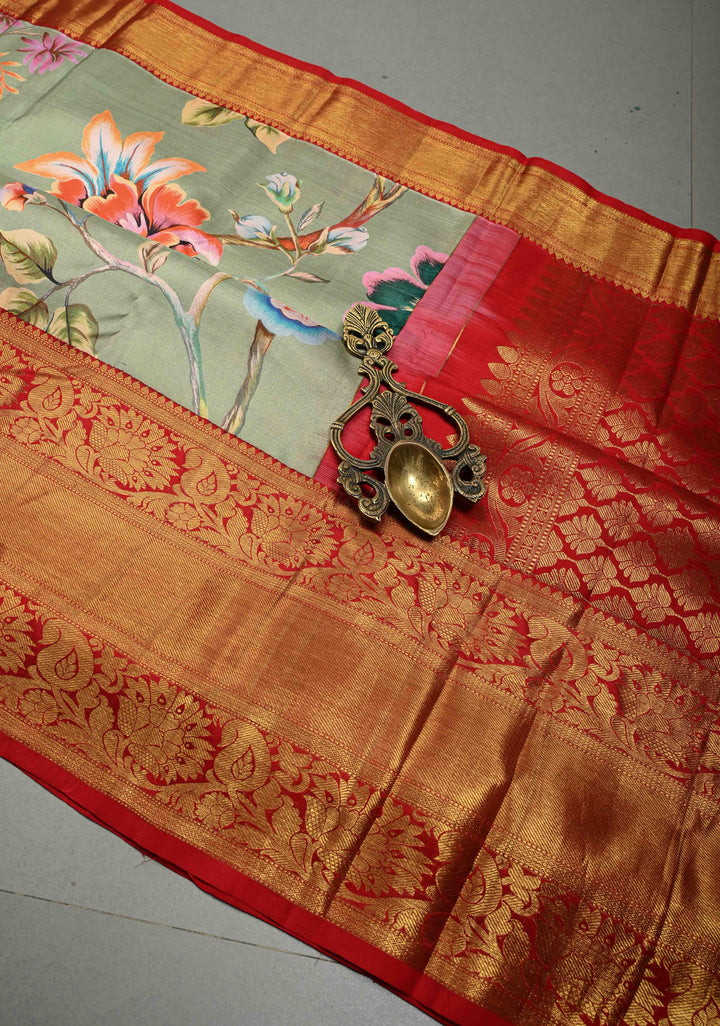 Dusty Sage Green Pure Kanjivaram Silk Saree with Floral Digital Print and Contrast Zari Border | SILK MARK CERTIFIED | SHOBITAM
