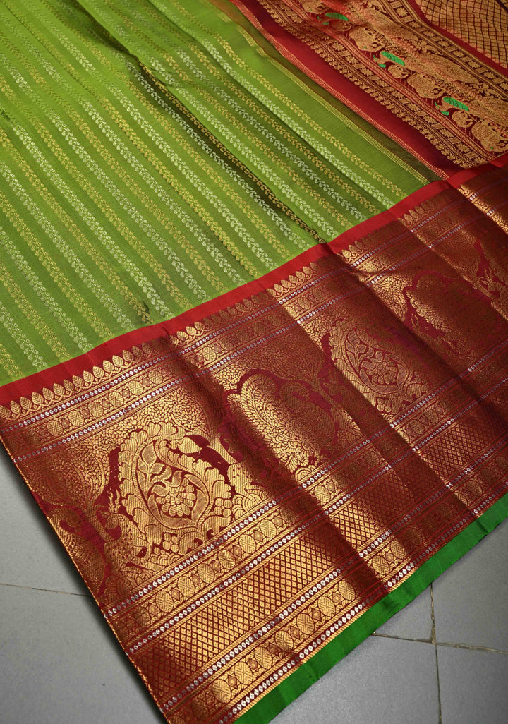 Deep Lime Green Pure Gadwal Silk Saree with Gold & Silver Ornate Zari Stripes and Contrast Wide Zari Border | SILK MARK CERTIFIED | SHOBITAM