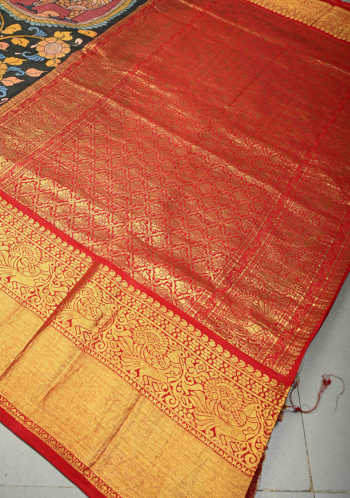 Peacock and Floral Theme : Authentic Pen Kalamkari Handpainted on Pure Kanjivaram Silk Saree with Contrast Wide Zari Border | SILK MARK CERTIFIED | SHOBITAM