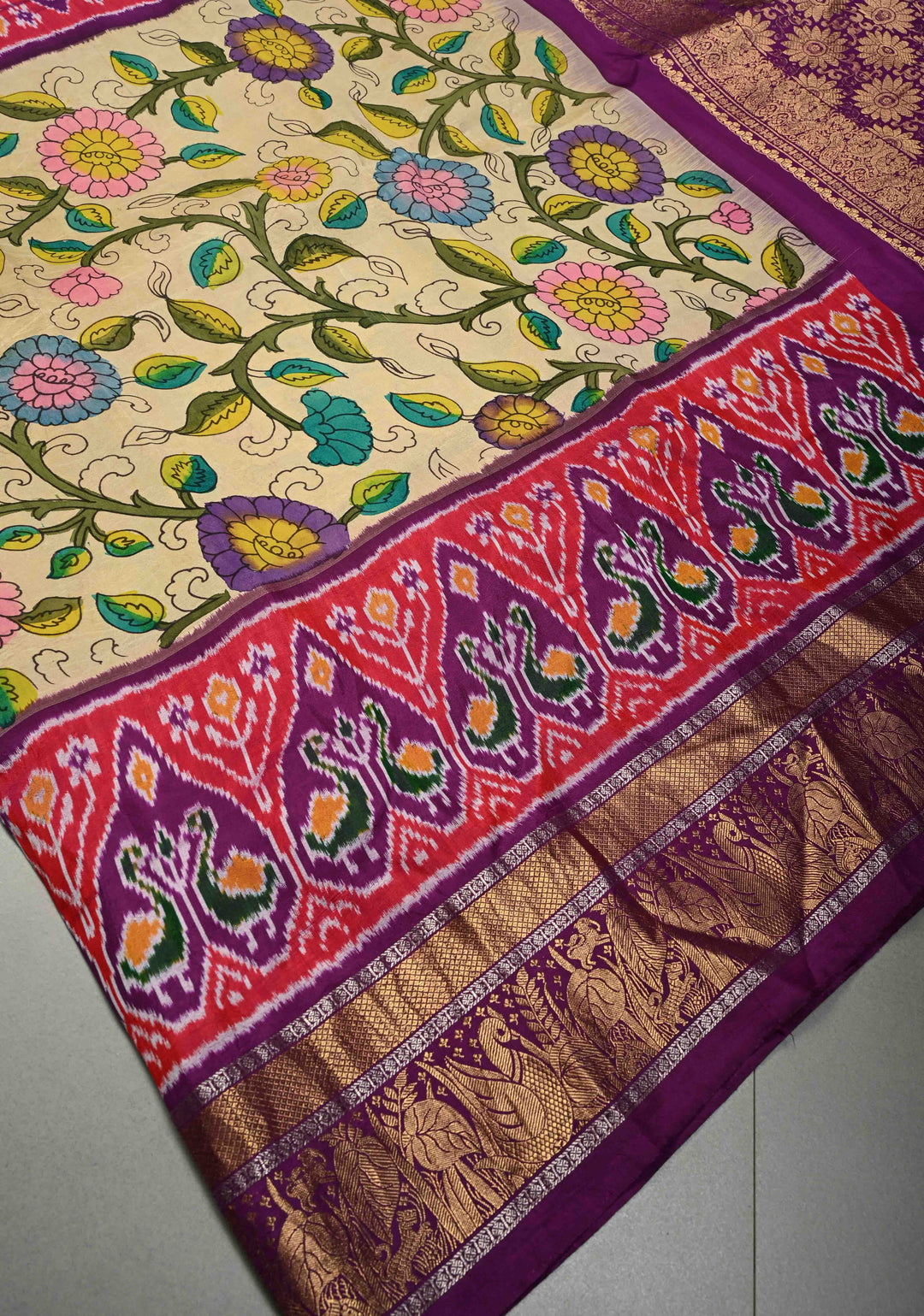 Authentic Pen Kalamkari Handpainted on Ikkat Pure Silk Saree with Contrast Ikkat Panel and Kanchi Border | SILK MARK CERTIFIED | SHOBITAM