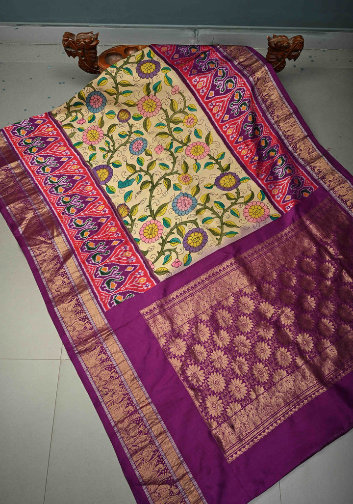 Authentic Pen Kalamkari Handpainted on Ikkat Pure Silk Saree with Contrast Ikkat Panel and Kanchi Border | SILK MARK CERTIFIED | SHOBITAM