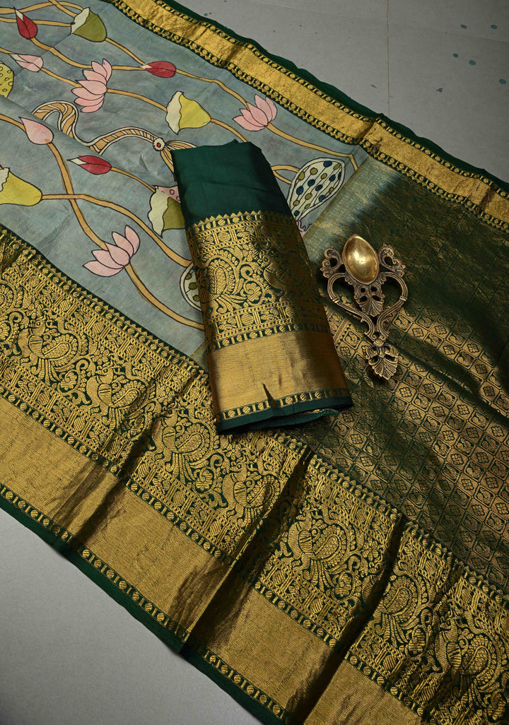Pichwai and Srinathji Theme :  Authentic Pen Kalamkari Handpainted on Pure Kanjivaram Silk Saree with Contrast Zari Border | SILK MARK CERTIFIED | SHOBITAM