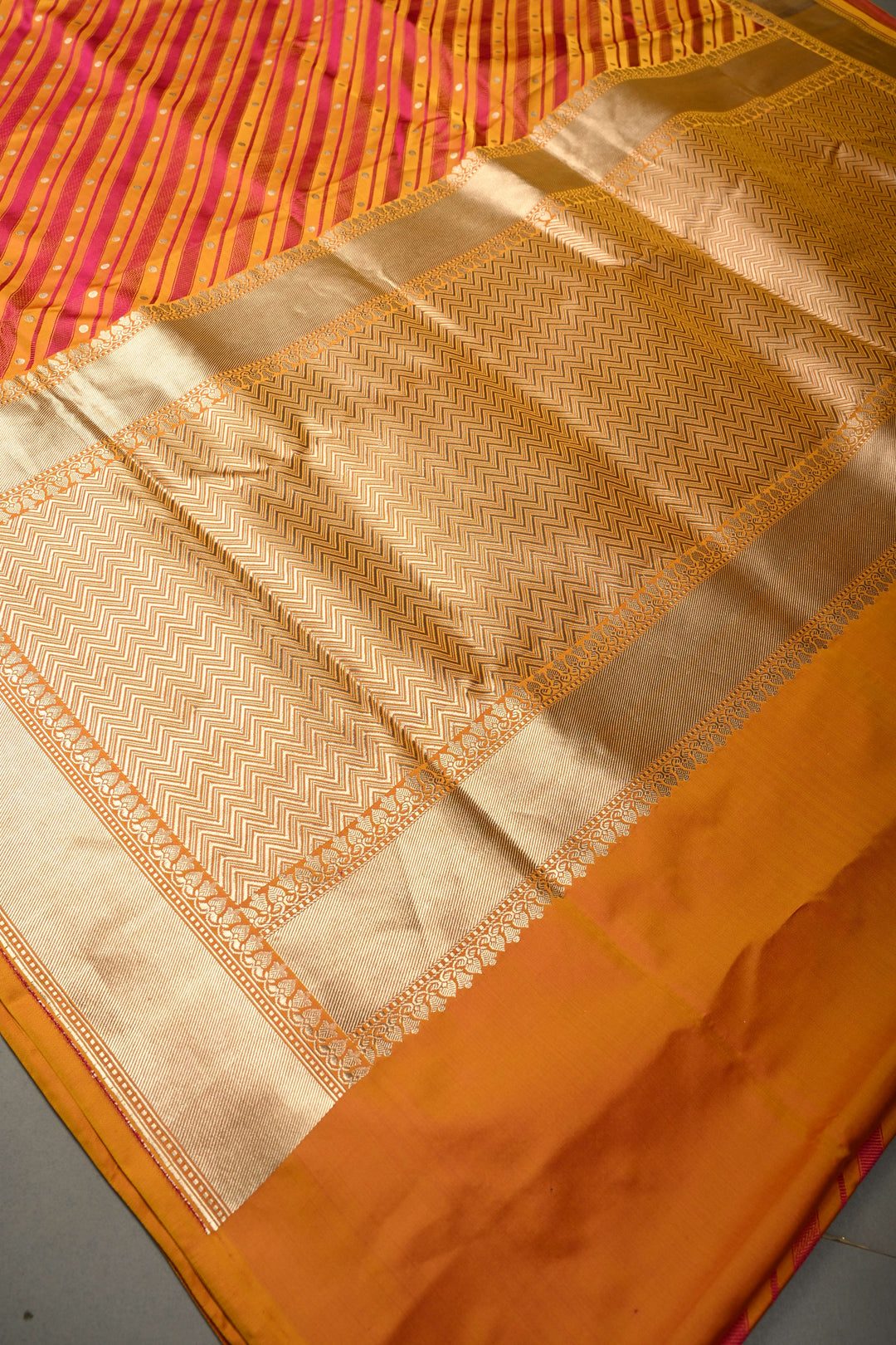 Yellowish Orange-Pink Dual Tone Stripes on Tanchoi Banarasi Silk Saree in Pure Silk Satin with Zari Polka Dots and Zari Border| SILK MARK CERTIFIED | SHOBITAM