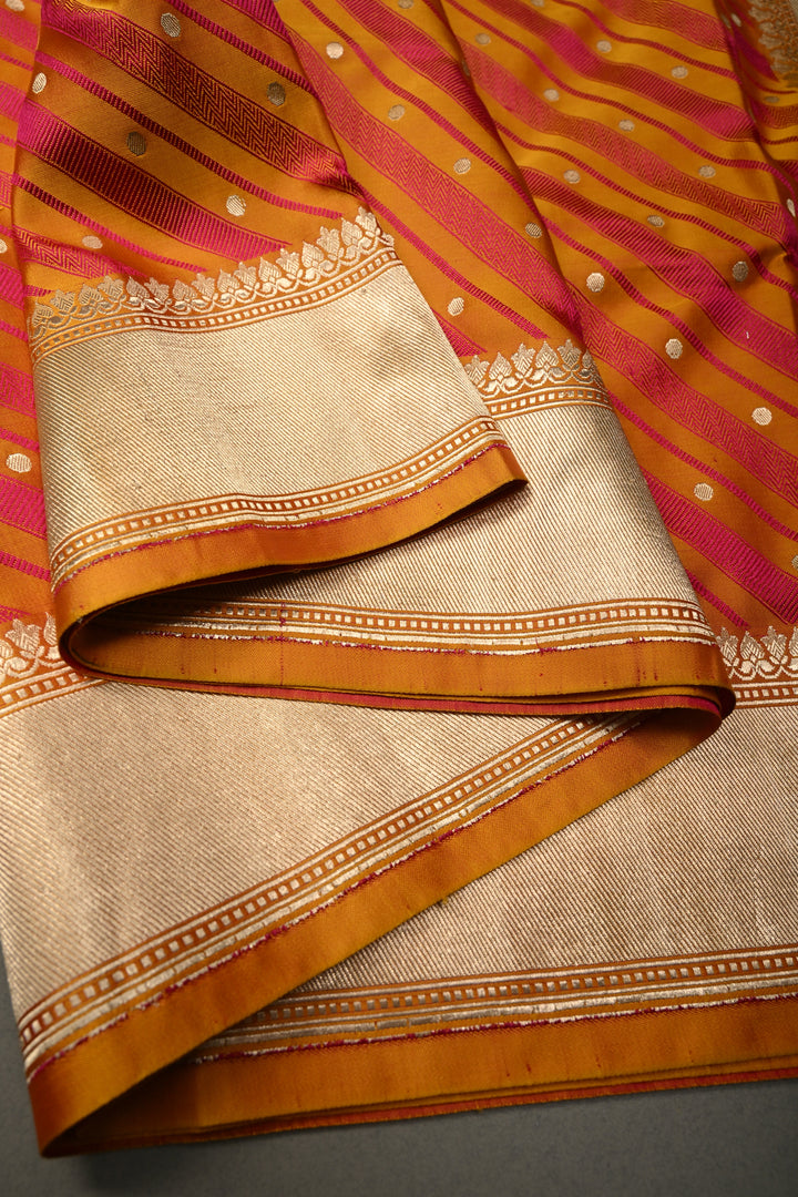 Yellowish Orange-Pink Dual Tone Stripes on Tanchoi Banarasi Silk Saree in Pure Silk Satin with Zari Polka Dots and Zari Border| SILK MARK CERTIFIED | SHOBITAM