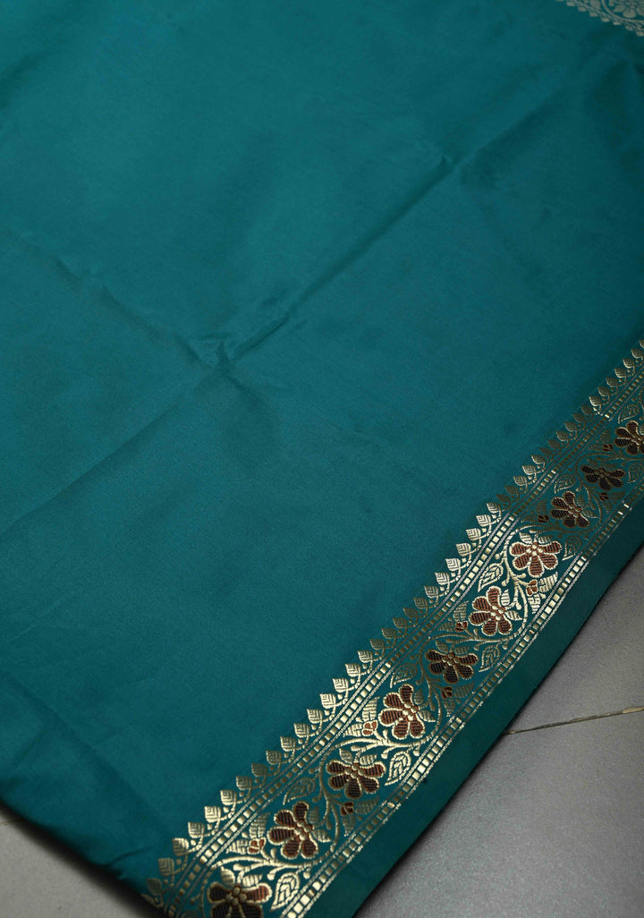 Teal Semi Silk Saree with Minimal Meenakari Floral Zari Border | SHOBITAM