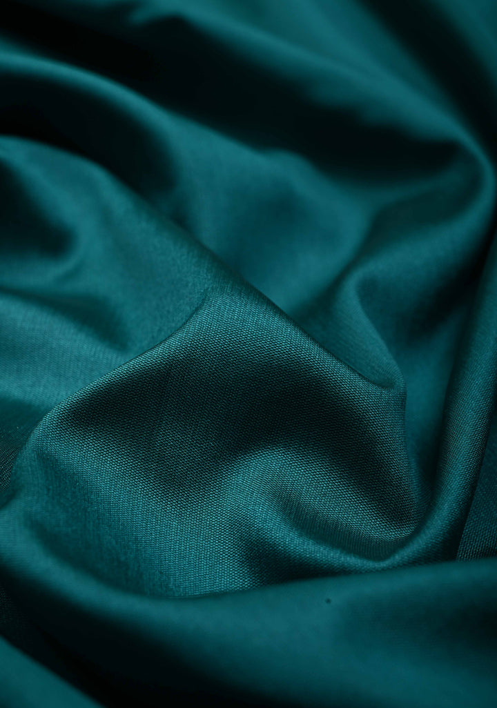 Teal Semi Silk Saree with Minimal Meenakari Floral Zari Border | SHOBITAM