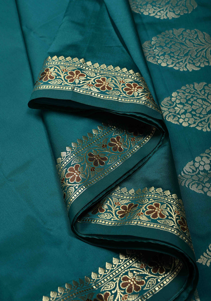 Teal Semi Silk Saree with Minimal Meenakari Floral Zari Border | SHOBITAM