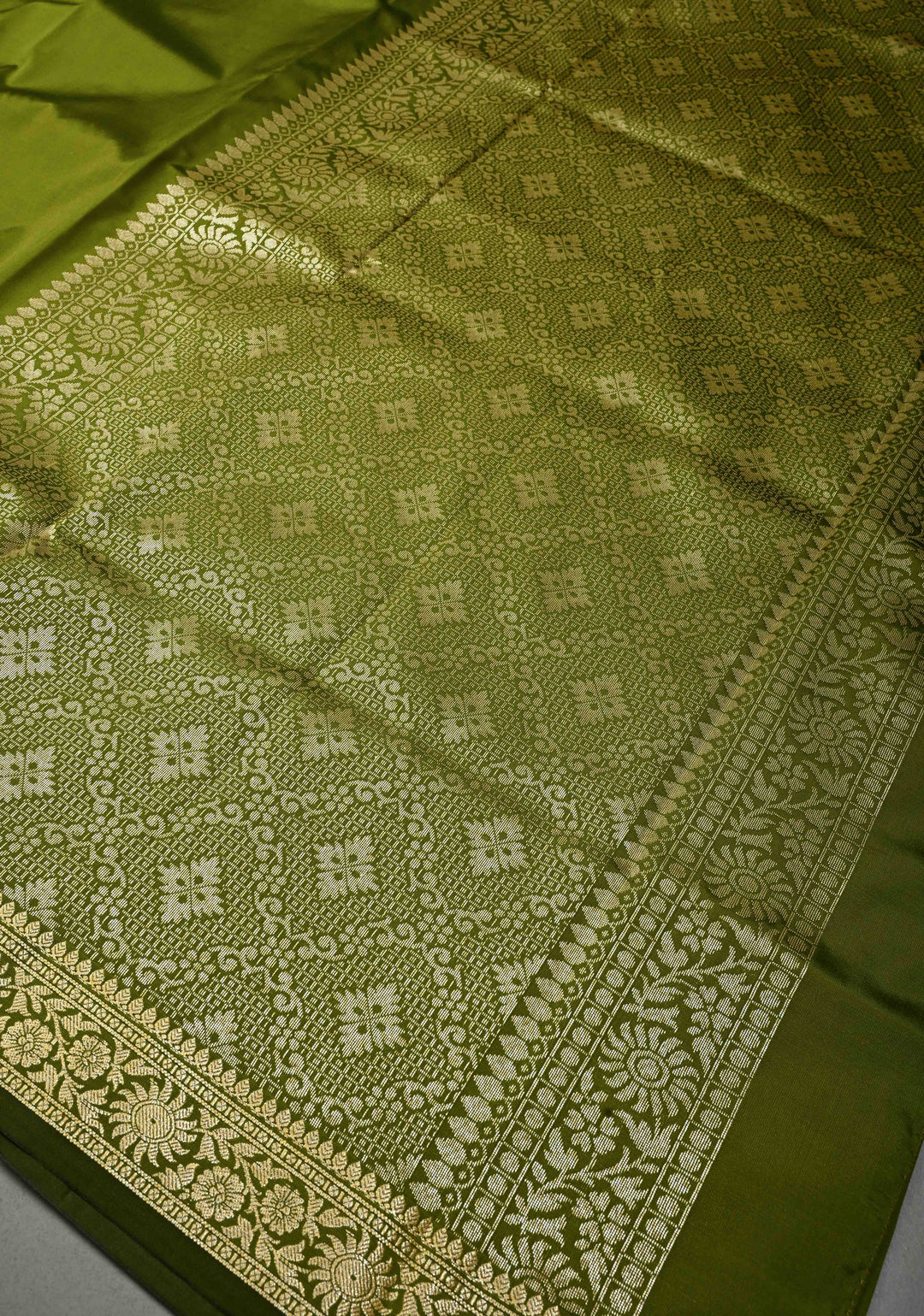 Henna Green Semi Silk Saree with Minimal Floral Zari Border | SHOBITAM