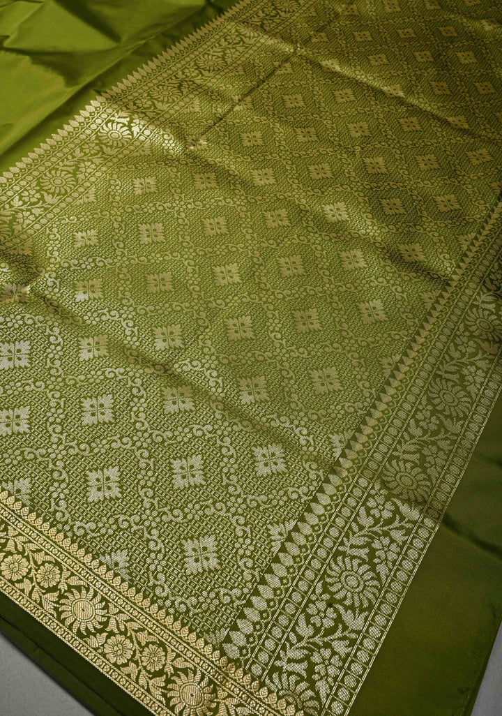 Henna Green Semi Silk Saree with Minimal Floral Zari Border | SHOBITAM
