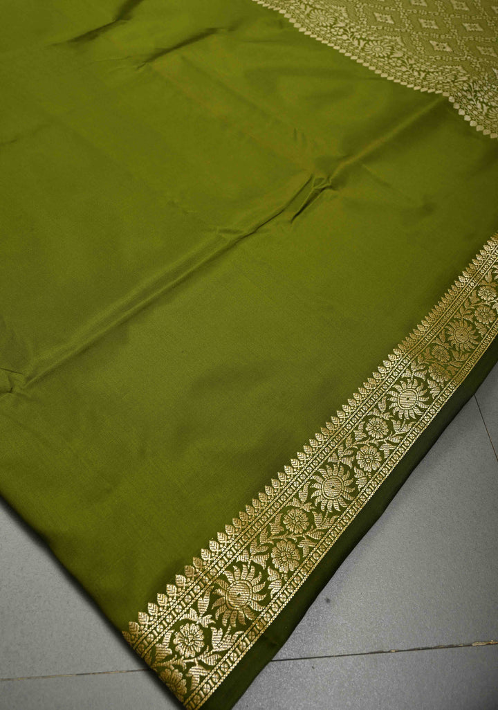 Henna Green Semi Silk Saree with Minimal Floral Zari Border | SHOBITAM