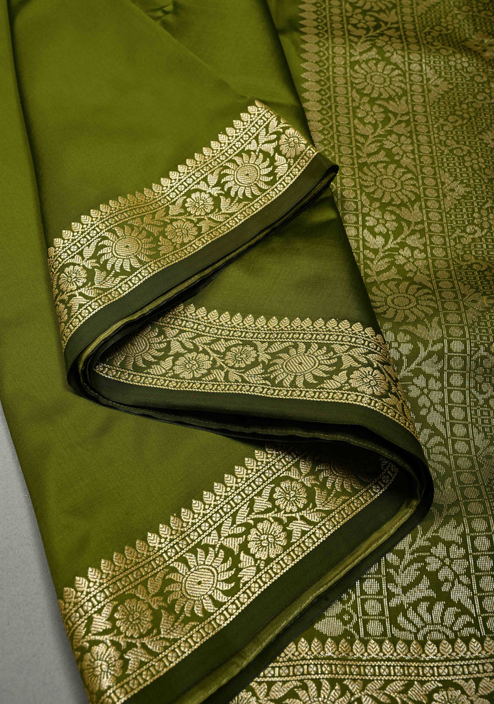 Henna Green Semi Silk Saree with Minimal Floral Zari Border | SHOBITAM