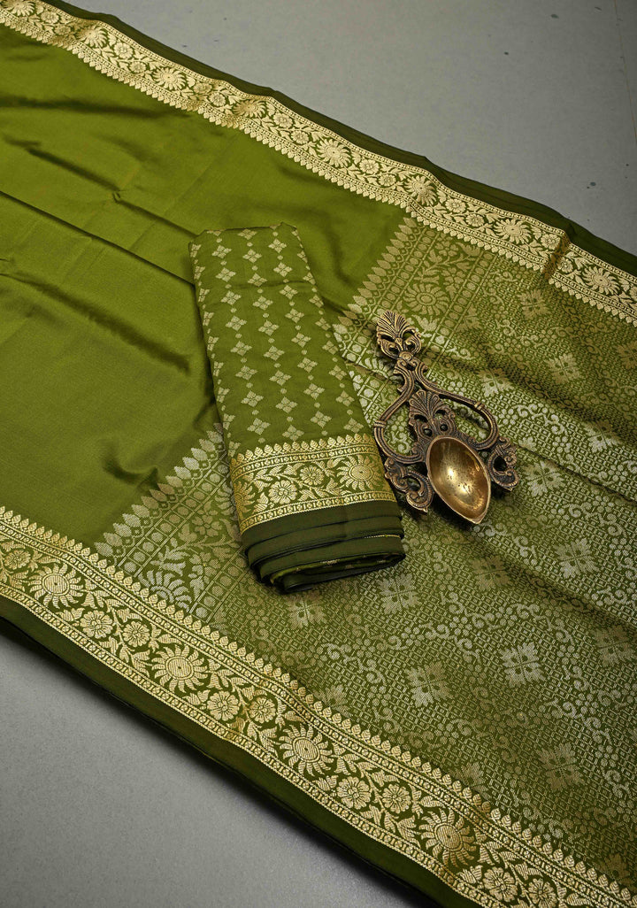 Henna Green Semi Silk Saree with Minimal Floral Zari Border | SHOBITAM