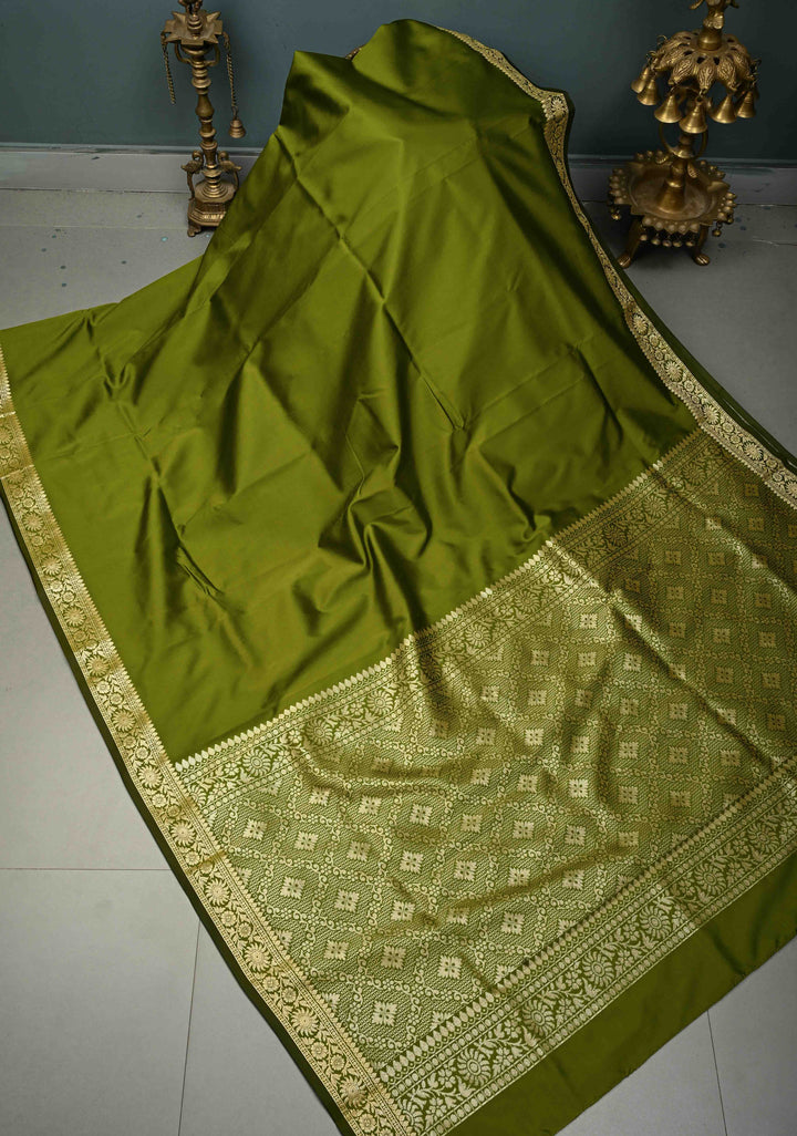 Henna Green Semi Silk Saree with Minimal Floral Zari Border | SHOBITAM