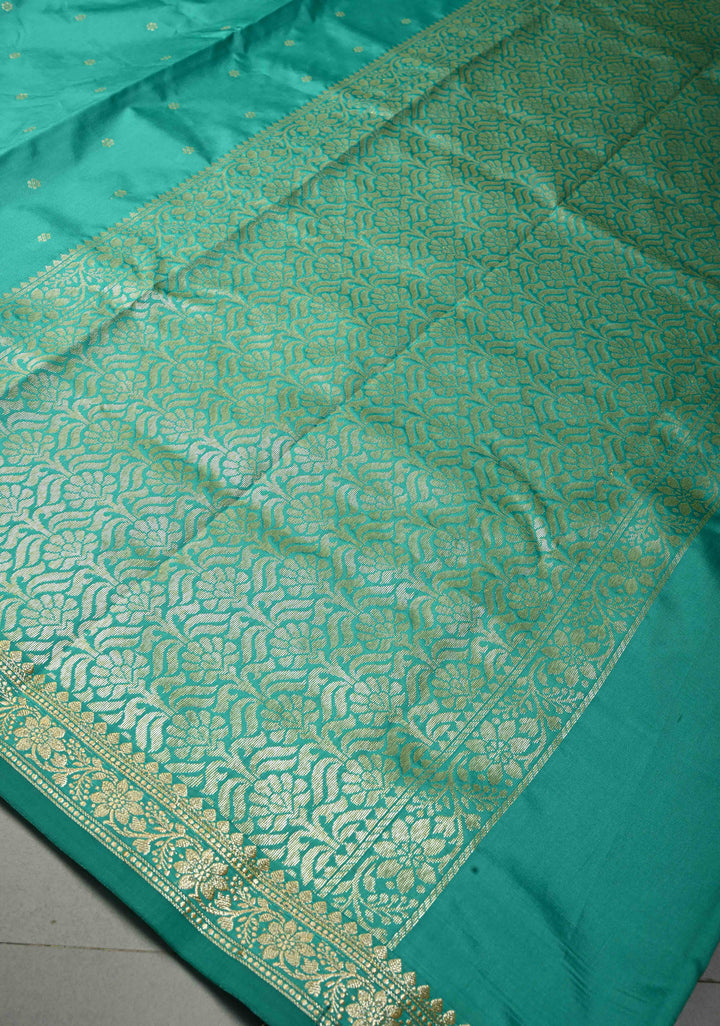 Dark Sea Green Semi Silk Saree with Chunri Zari Buttis and Minimal Zari Border | SHOBITAM