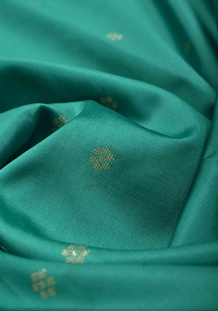 Dark Sea Green Semi Silk Saree with Chunri Zari Buttis and Minimal Zari Border | SHOBITAM
