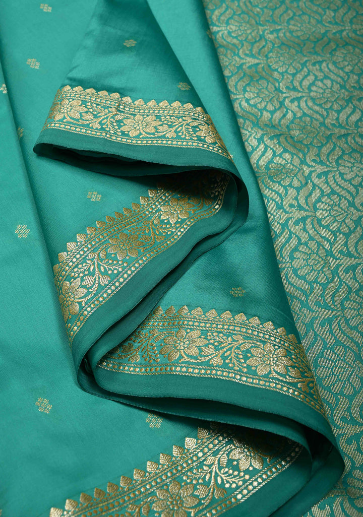 Dark Sea Green Semi Silk Saree with Chunri Zari Buttis and Minimal Zari Border | SHOBITAM