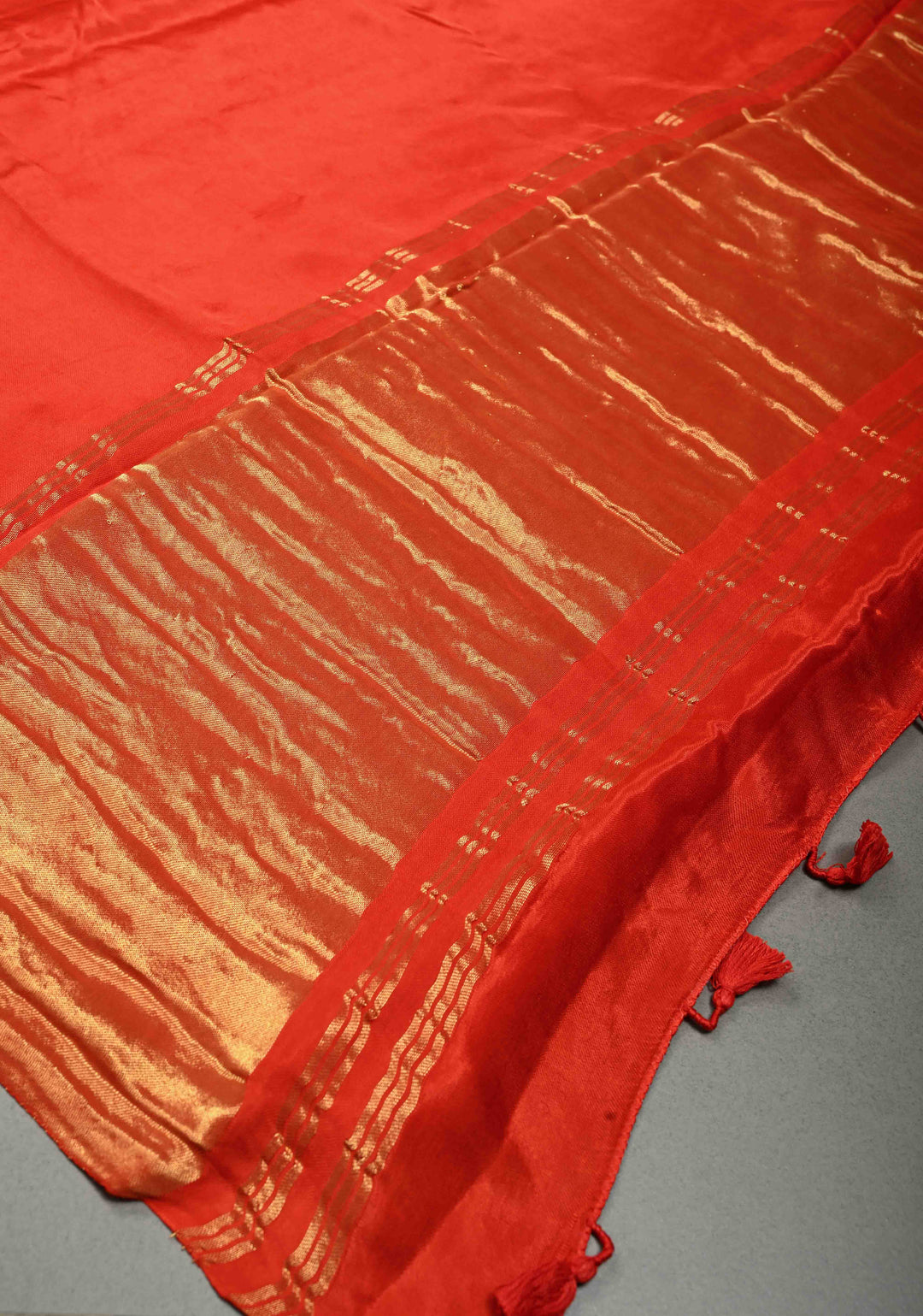 Orangish Red Borderless Modal Silk Saree with Lagda Patta Crushed Pallu | SHOBITAM