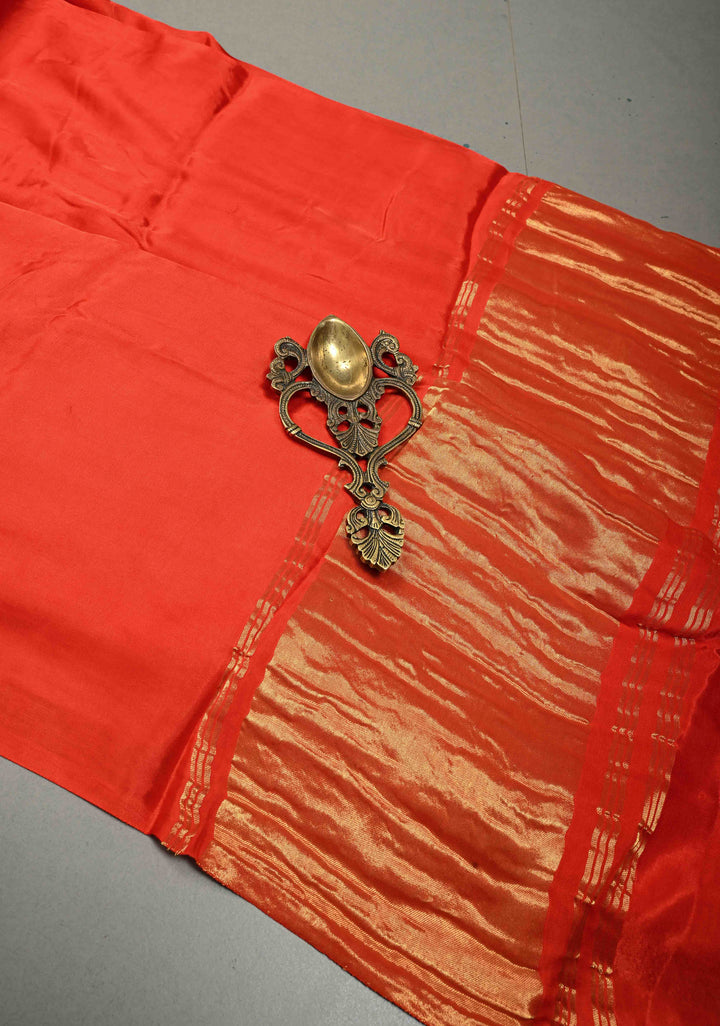 Orangish Red Borderless Modal Silk Saree with Lagda Patta Crushed Pallu | SHOBITAM