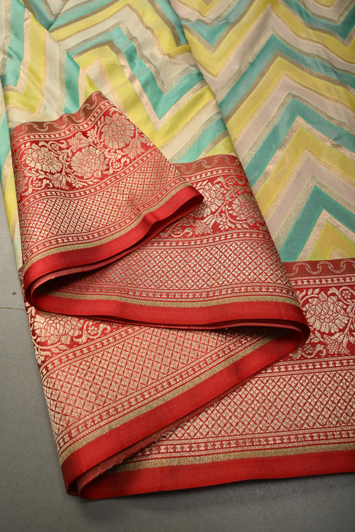 Ivory-Yellow-Turquoise Pure Banarasi Katan Silk Saree with Chevron Design Contrast Zari Border | SILK MARK CERTIFIED | SHOBITAM