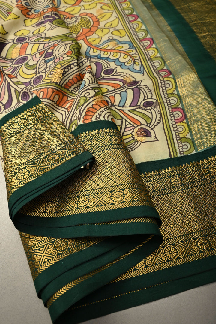 Peacock-Floral Theme : Light Sage Green Authentic Pen Kalamkari Handpainted on Pure Kanjivaram Silk Saree with Contrast Zari Border | SILK MARK CERTIFIED | SHOBITAM
