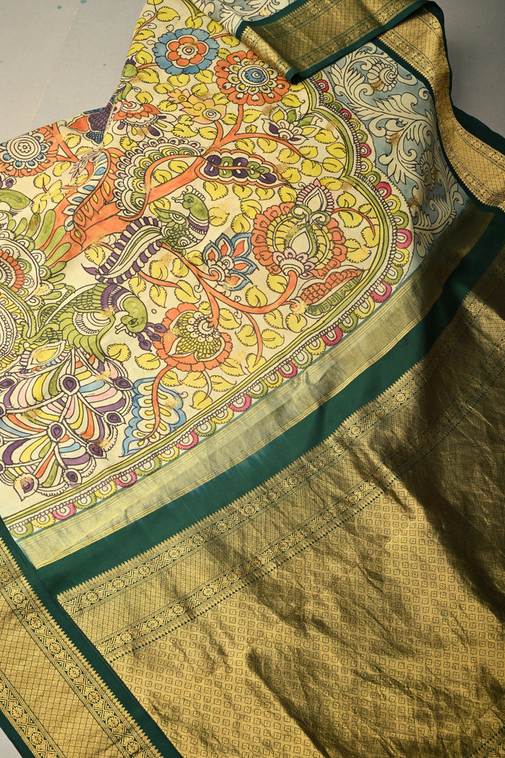 Peacock-Floral Theme : Light Sage Green Authentic Pen Kalamkari Handpainted on Pure Kanjivaram Silk Saree with Contrast Zari Border | SILK MARK CERTIFIED | SHOBITAM