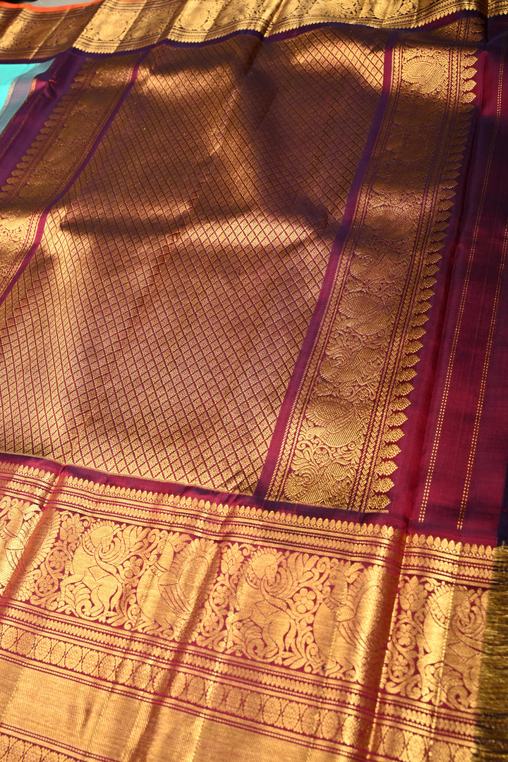 Teal Korvai Gadwal Silk Saree with Gold-Silver Floral Zari Buttas and Two Tone Contrast Wide Zari Border | SILK MARK CERTIFIED | SHOBITAM