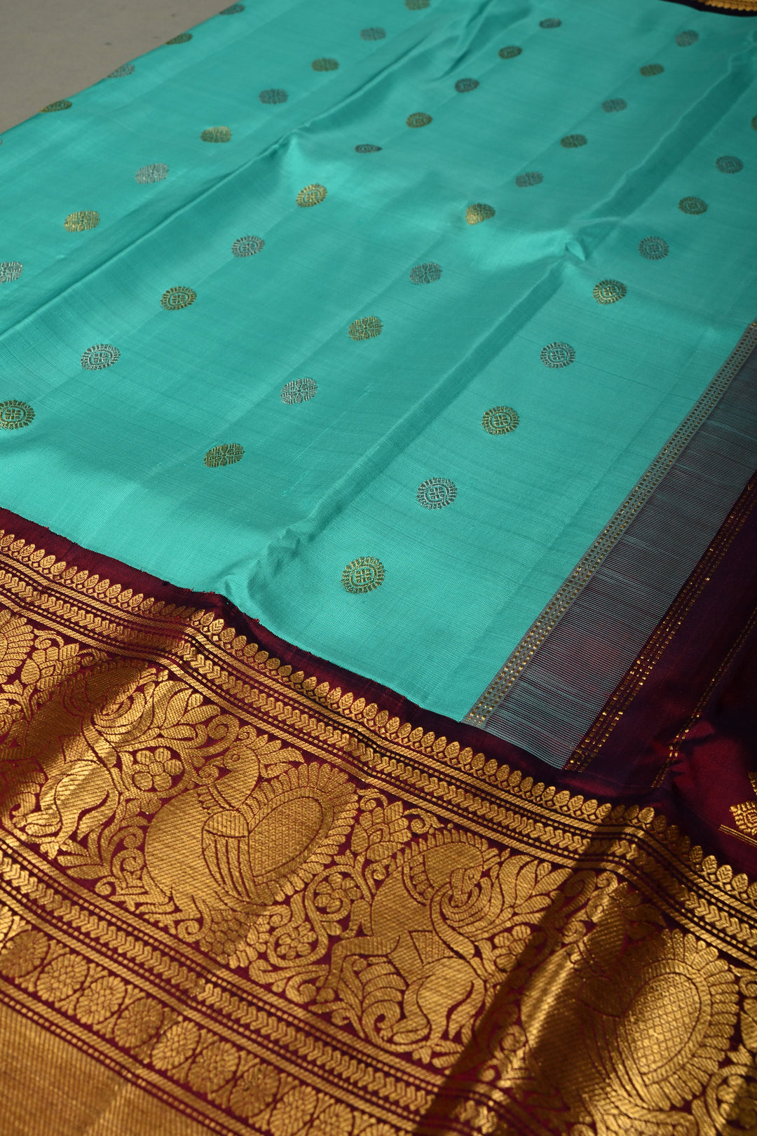 Teal Korvai Gadwal Silk Saree with Gold-Silver Floral Zari Buttas and Two Tone Contrast Wide Zari Border | SILK MARK CERTIFIED | SHOBITAM