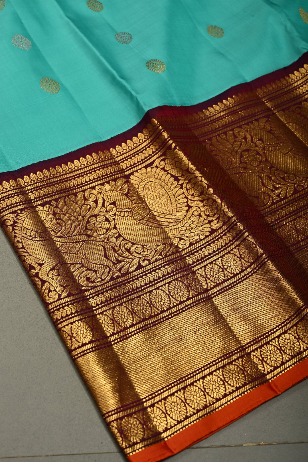 Teal Korvai Gadwal Silk Saree with Gold-Silver Floral Zari Buttas and Two Tone Contrast Wide Zari Border | SILK MARK CERTIFIED | SHOBITAM