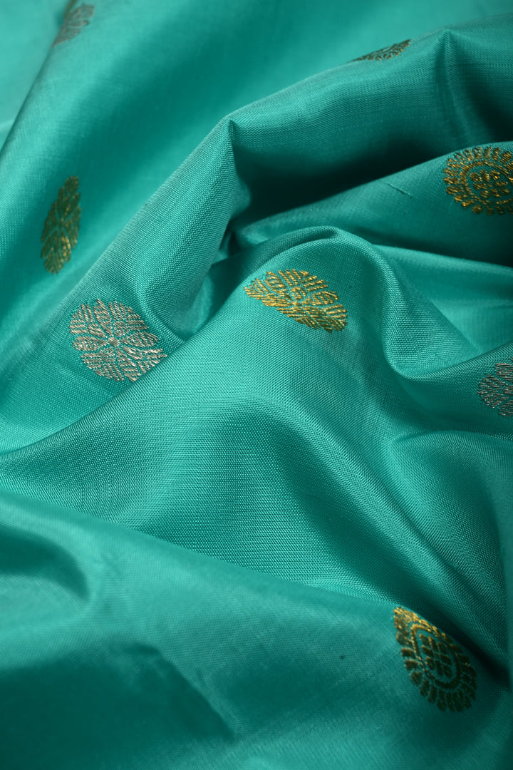 Teal Korvai Gadwal Silk Saree with Gold-Silver Floral Zari Buttas and Two Tone Contrast Wide Zari Border | SILK MARK CERTIFIED | SHOBITAM