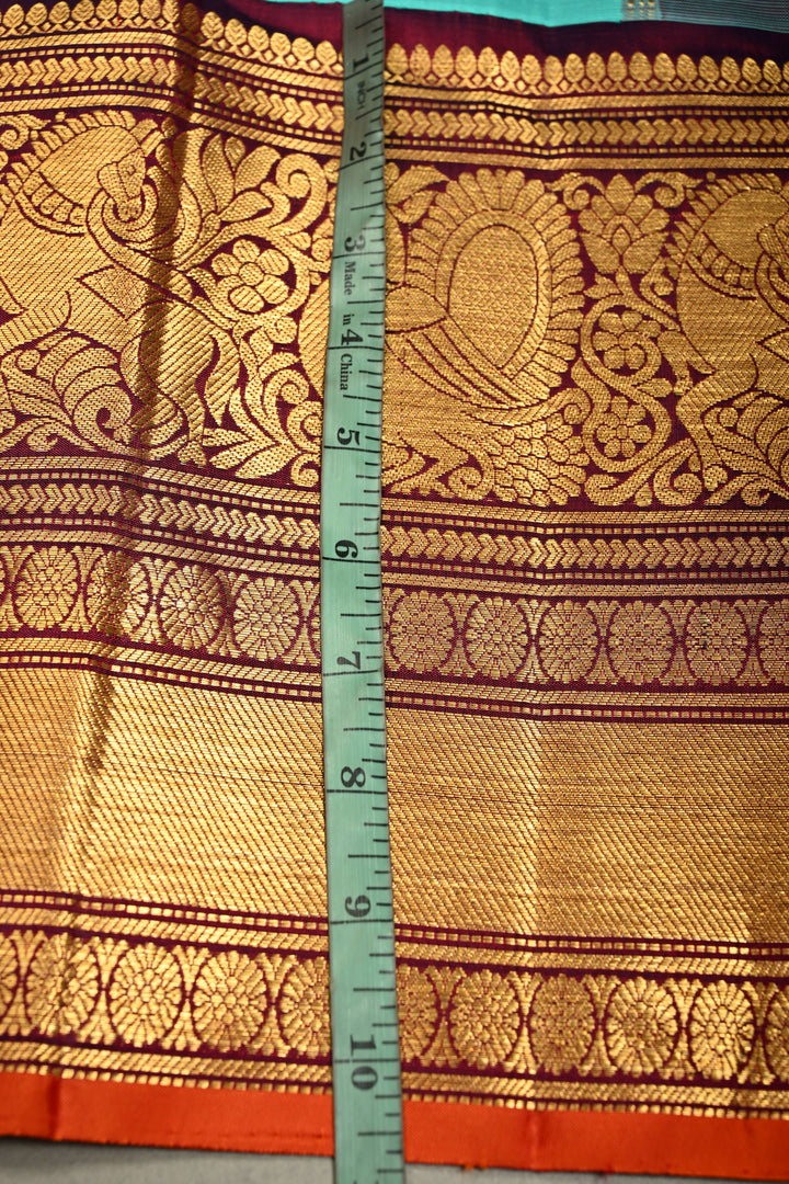 Teal Korvai Gadwal Silk Saree with Gold-Silver Floral Zari Buttas and Two Tone Contrast Wide Zari Border | SILK MARK CERTIFIED | SHOBITAM