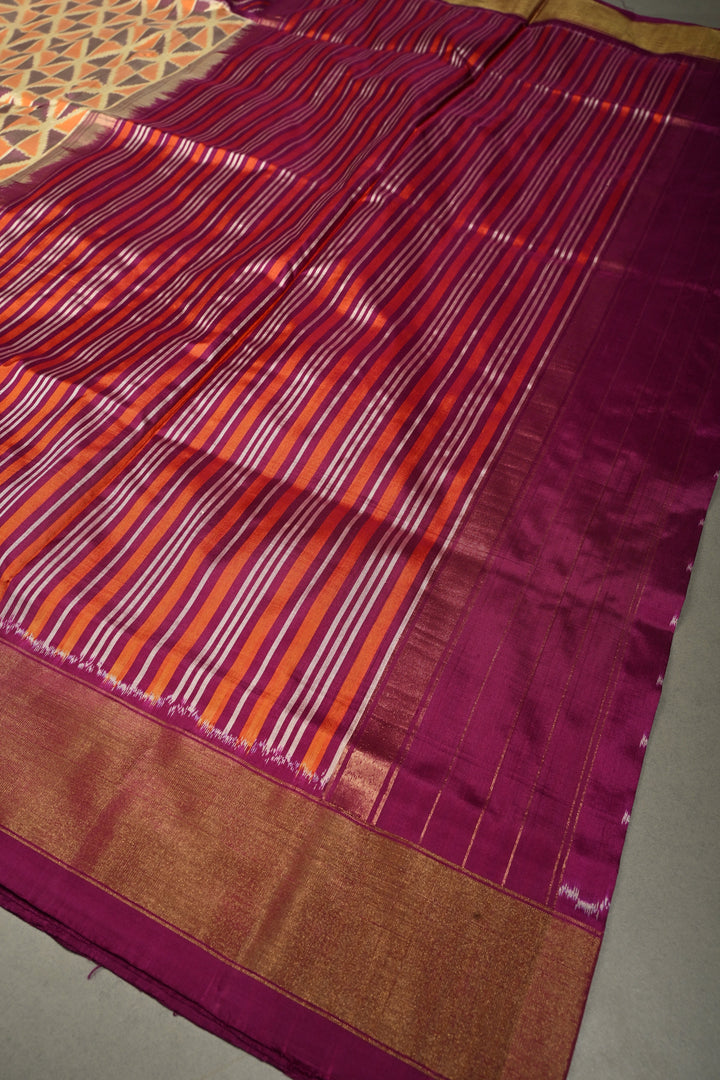 Muted Yellow Pochampally Ikkat Pure Silk Saree with Kente Design and Diagonal Stripes Contrast Panel on Tissue Zari Border  | SILK MARK CERTIFIED | SHOBITAM