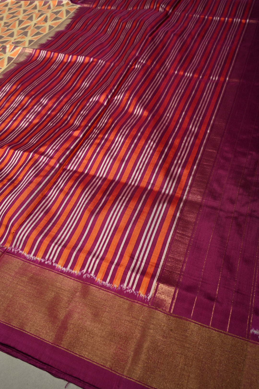 Muted Yellow Pochampally Ikkat Pure Silk Saree with Kente Design and Diagonal Stripes Contrast Panel on Tissue Zari Border  | SILK MARK CERTIFIED | SHOBITAM