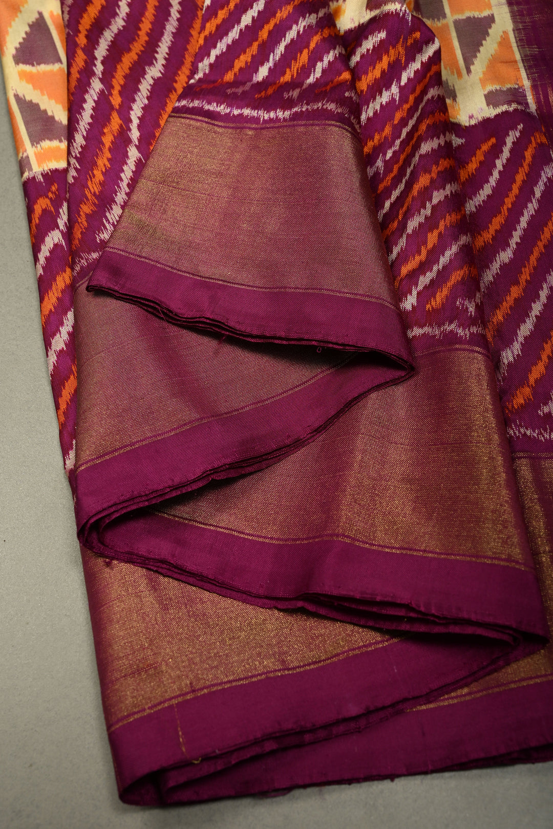 Muted Yellow Pochampally Ikkat Pure Silk Saree with Kente Design and Diagonal Stripes Contrast Panel on Tissue Zari Border  | SILK MARK CERTIFIED | SHOBITAM