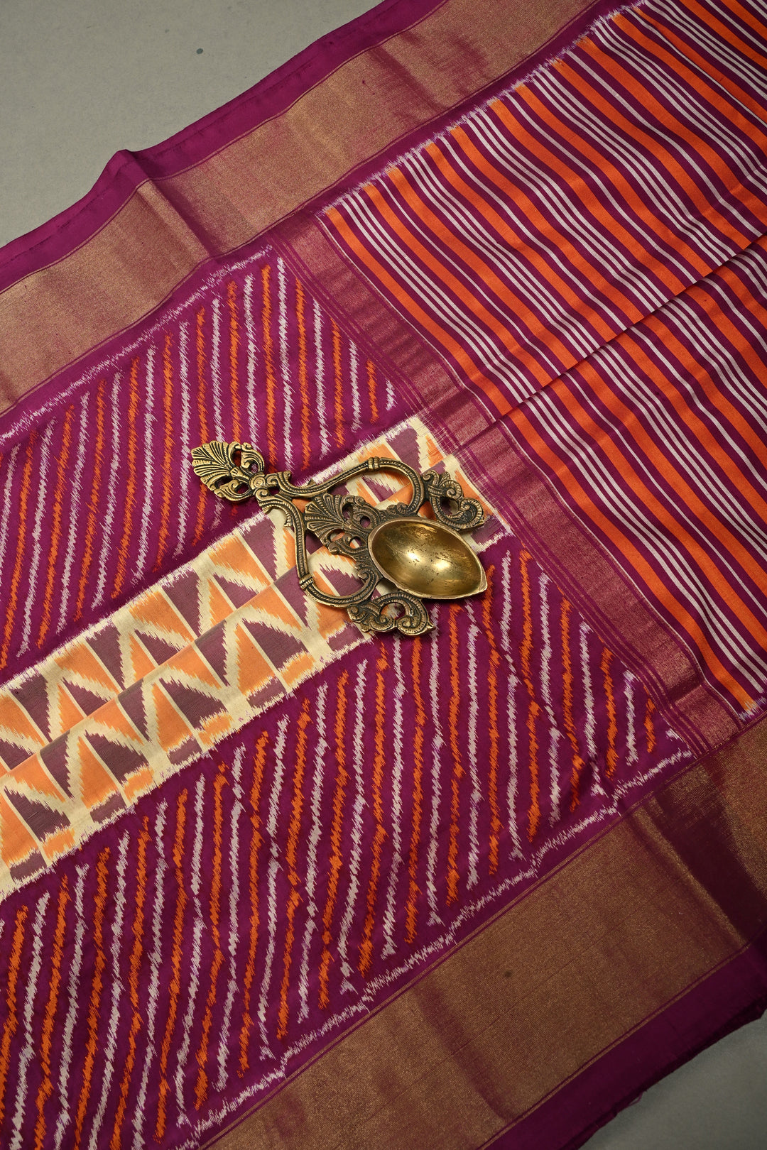 Muted Yellow Pochampally Ikkat Pure Silk Saree with Kente Design and Diagonal Stripes Contrast Panel on Tissue Zari Border  | SILK MARK CERTIFIED | SHOBITAM