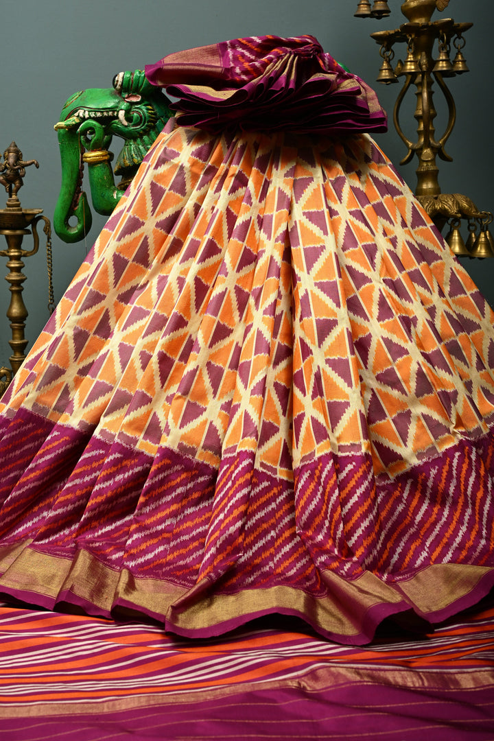 Muted Yellow Pochampally Ikkat Pure Silk Saree with Kente Design and Diagonal Stripes Contrast Panel on Tissue Zari Border  | SILK MARK CERTIFIED | SHOBITAM