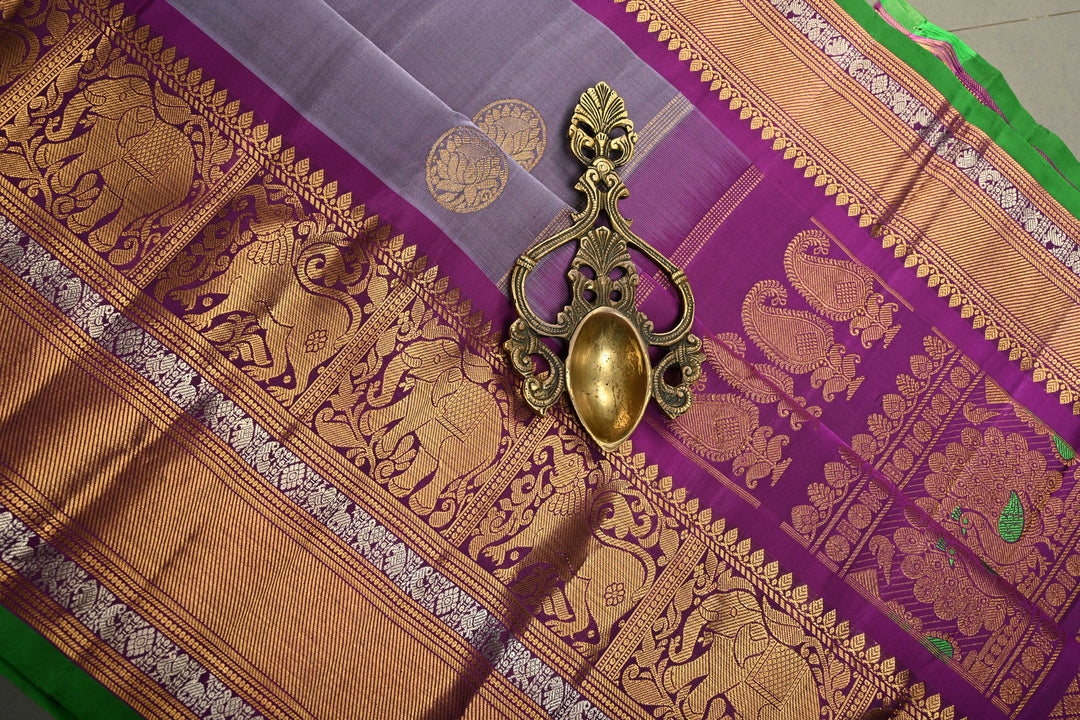 Gray-Dusty Lavender Gadwal Silk Saree with Gold-Silver Floral Zari Buttas and Contrast Wide Zari Border | SILK MARK CERTIFIED | SHOBITAM
