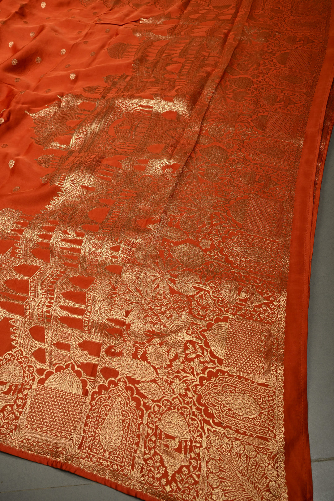 Rust Orange Vegan Viscose Silk Saree with Floral Zari Buttas and Scallop Border | SHOBITAM