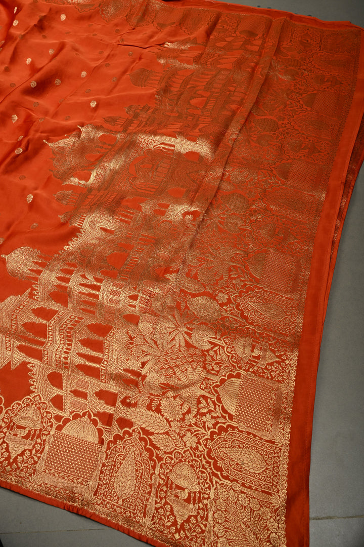 Rust Orange Vegan Viscose Silk Saree with Floral Zari Buttas and Scallop Border | SHOBITAM