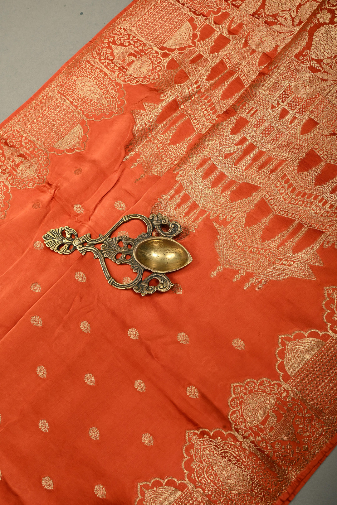 Rust Orange Vegan Viscose Silk Saree with Floral Zari Buttas and Scallop Border | SHOBITAM