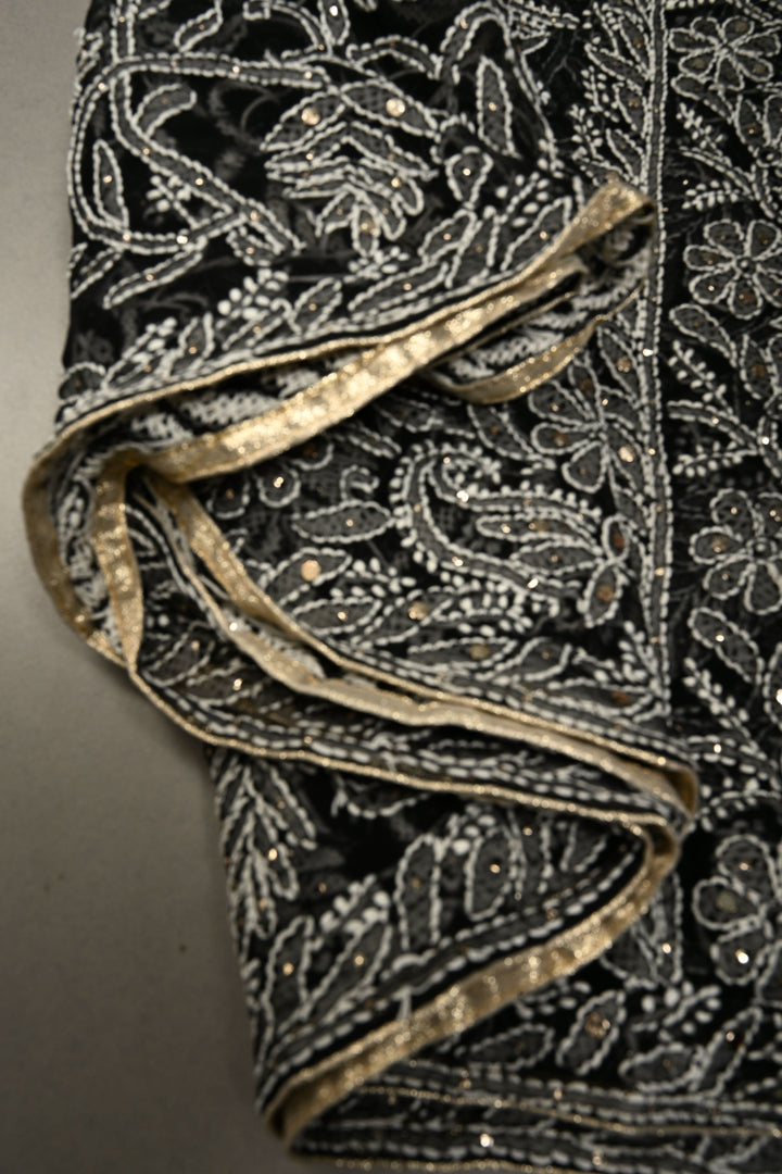 Royal Black Hand-Embroidered Full Jaal Chikankari Georgette Saree with Mukesh work and Contrast Kanjivaram Border | SHOBITAM