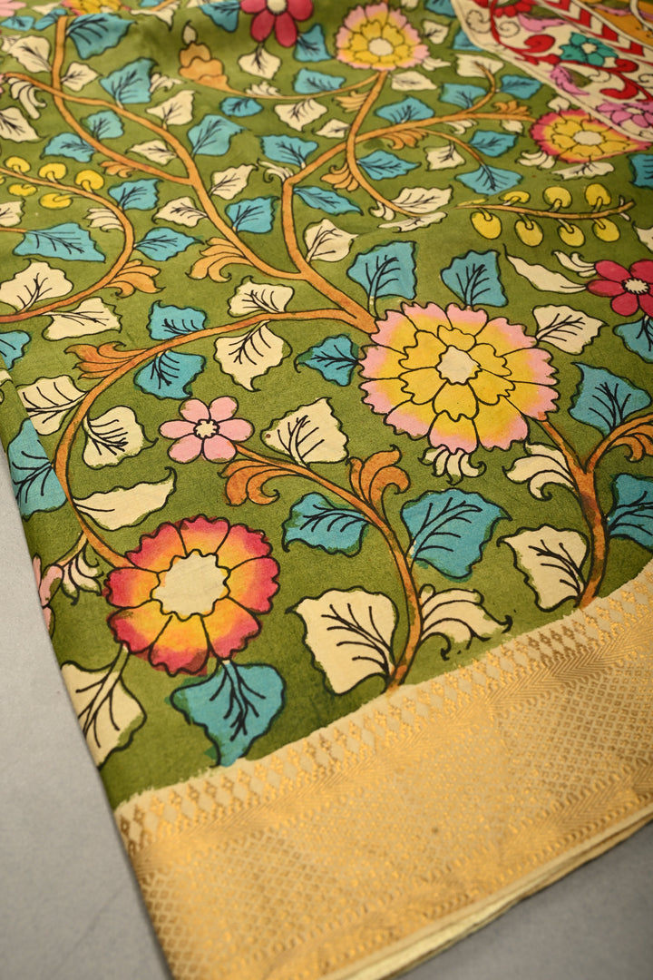 Floral-Twin Peacock Motifs on Pallu Theme: Authentic Mehendi Green Pen Kalamkari Handpainted on Silk Cotton Saree with Mangalagiri Zari Borders
