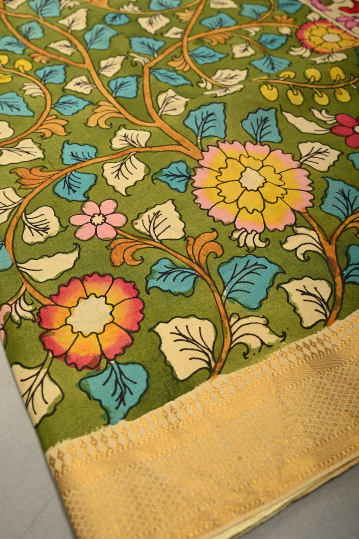 Floral-Twin Peacock Motifs on Pallu Theme: Authentic Mehendi Green Pen Kalamkari Handpainted on Silk Cotton Saree with Mangalagiri Zari Borders