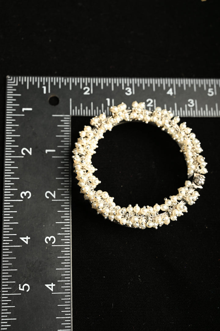 White Fiza Bangle in Brass-stones and pearls with an Antique Silver Polish | SHOBITAM