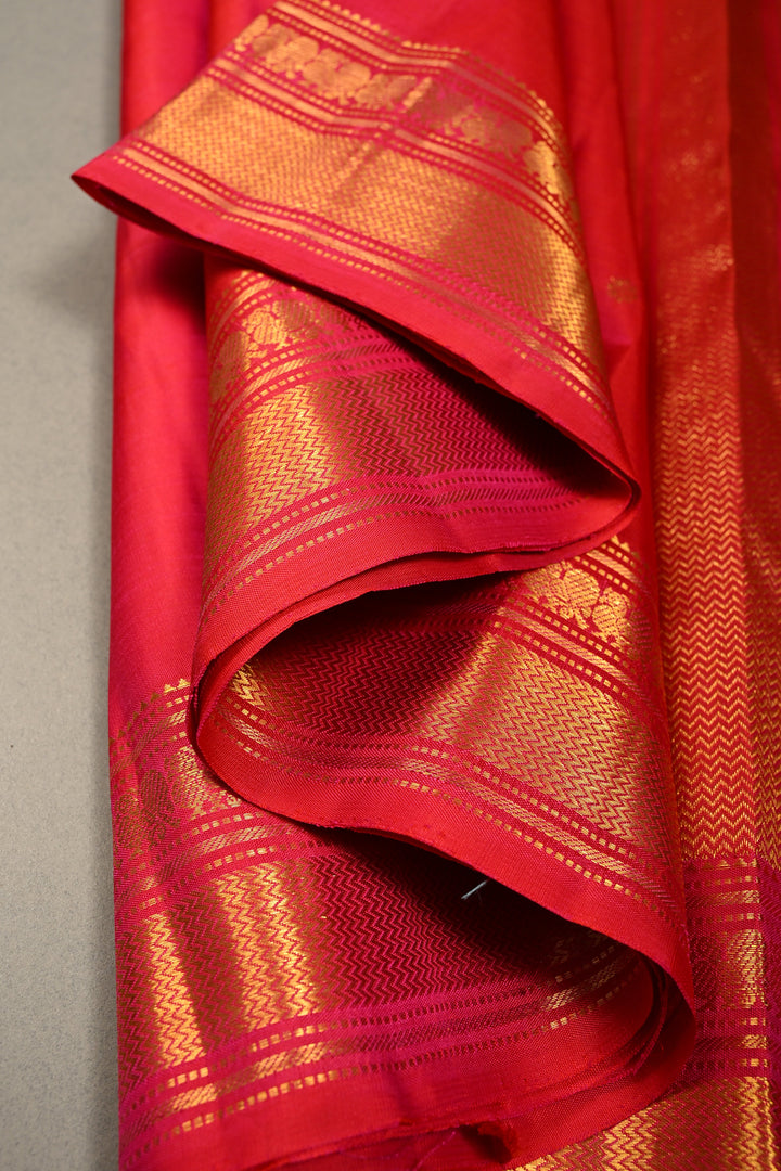 Pinkish Orange Dual tone Kanjivaram Pure Silk Saree with Zari Buttis and Zari Border | SILK MARK CERTIFIED
