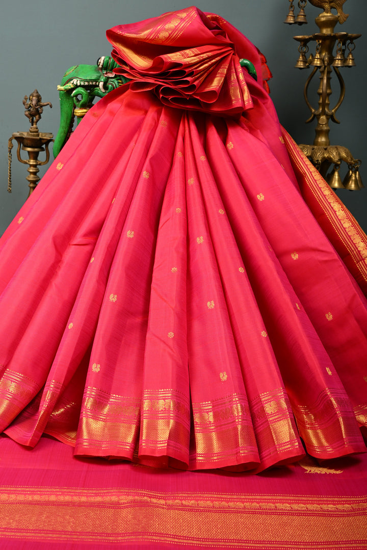 Pinkish Orange Dual tone Kanjivaram Pure Silk Saree with Zari Buttis and Zari Border | SILK MARK CERTIFIED